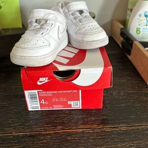 Baby white Nike sneakers